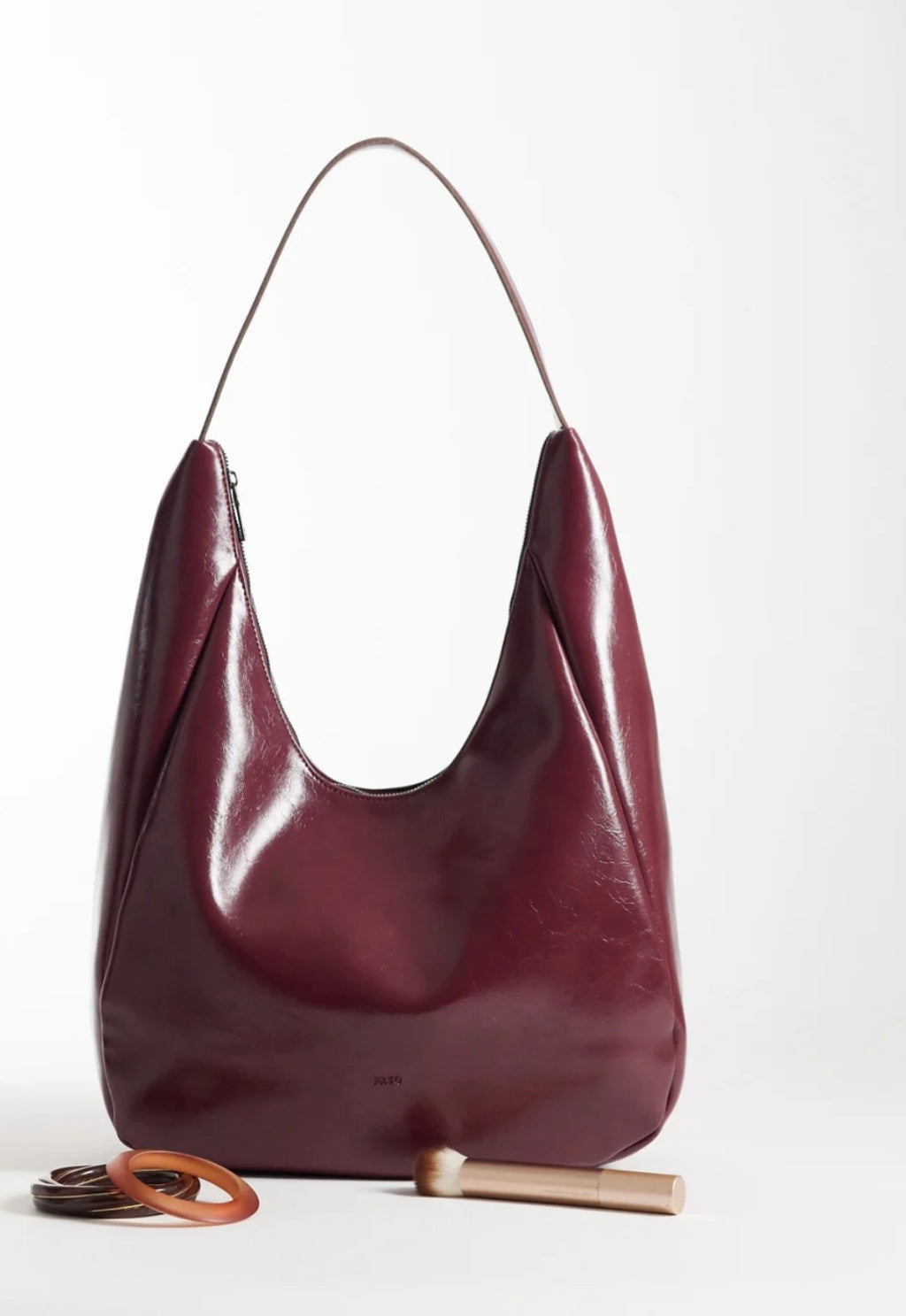 PASQ slouchy shoulder bag in shiny burgundy